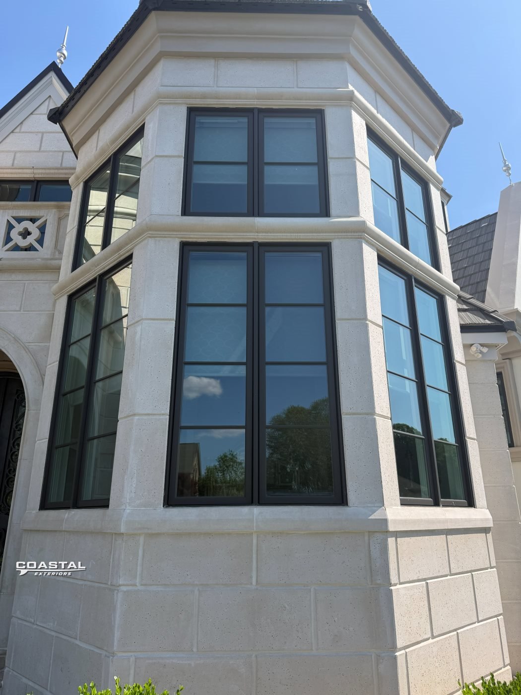 Stone home bay windows cleaned crystal clear